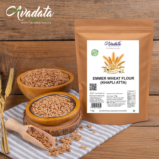 Emmer wheat flour package with bowls of wheat and wheat stalks on a wooden background, featuring Avadata brand.